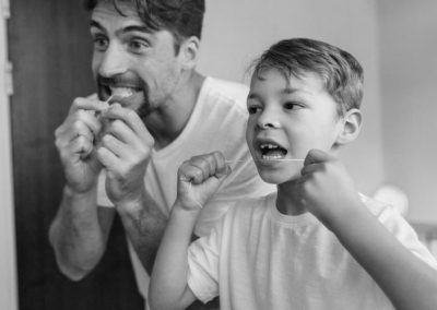 boy-and-father-flossing